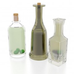 Trzy buteleczki szklane z przyprawami